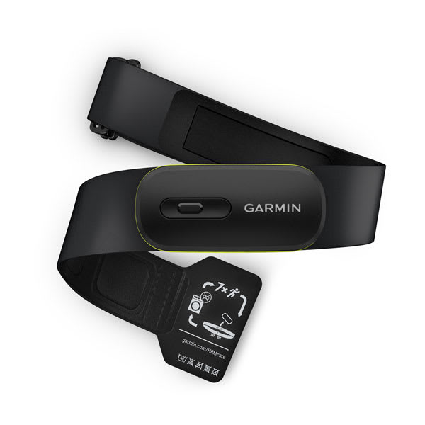 Garmin HRM 600 chest strap heart rate monitor showing the detachable sensor pod, the soft fabric strap with hook-and-loop closure, and the tri-color LED status indicator on the front of the pod