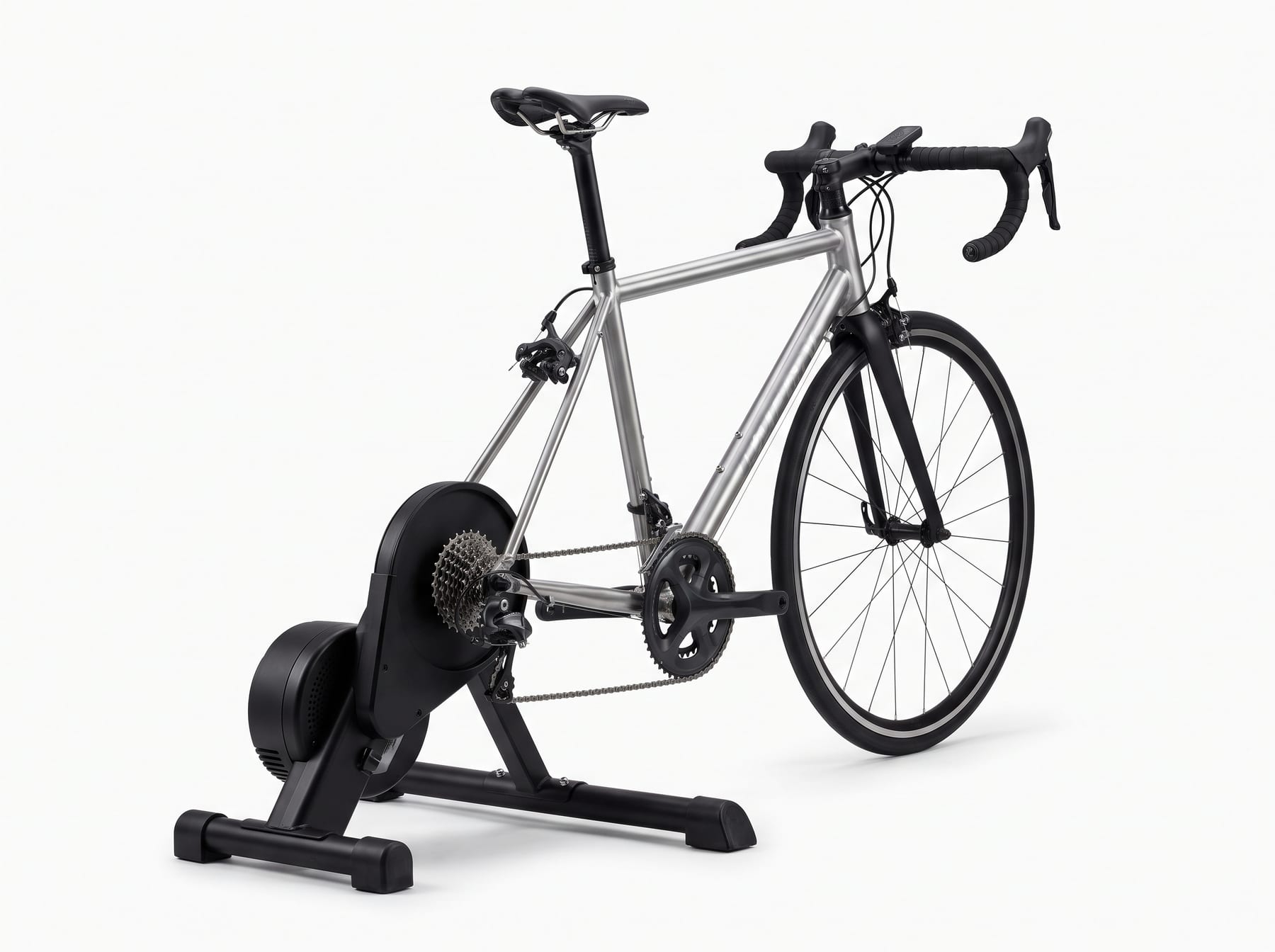JetBlack Victory with road bike attached, showing Zwift Cog v2 cassette and Zwift Click controller on the handlebar