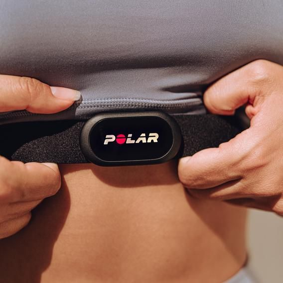 Polar H10 chest strap worn on torso — in-use placement under shirt